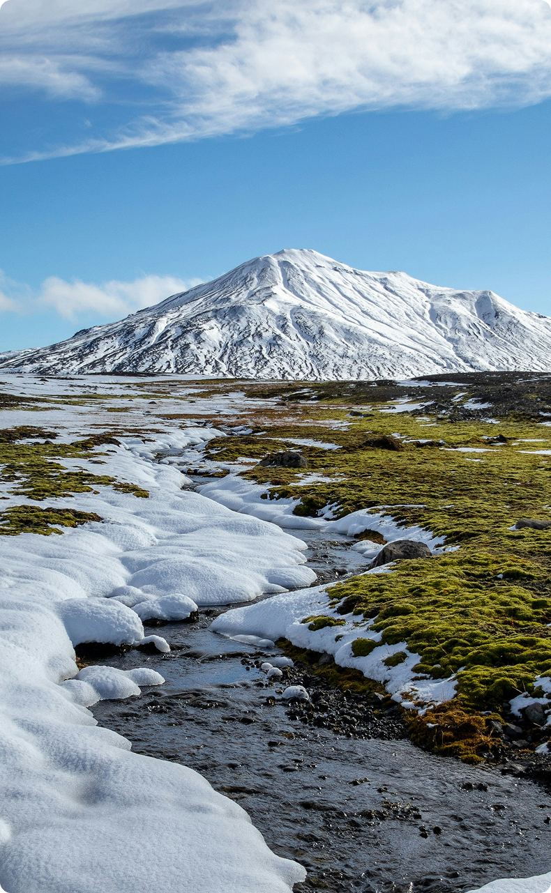 Photo of a snowy mountain